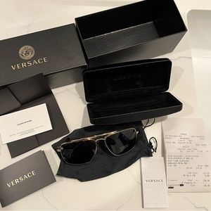 Metal gold frames, dark black lenses